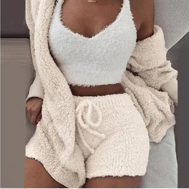 Gorgeous lavender knit ensemble, the perfect gift for her. This 3-piece set includes a fluffy top, shorts, and a cardigan.